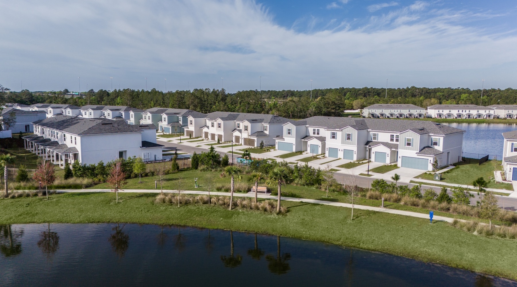 exterior of building showing the property's lush landscaping